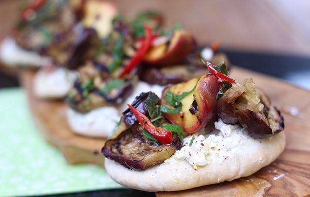 Grilled aubergine, peach, whipped feta and mint pittas