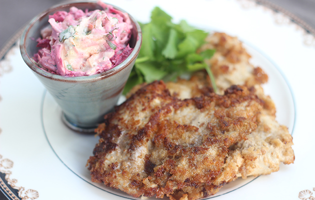 Crispy pheasant breast with parmesan and spiced root veg slaw