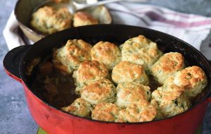 Game cobbler with smoked cheese scones