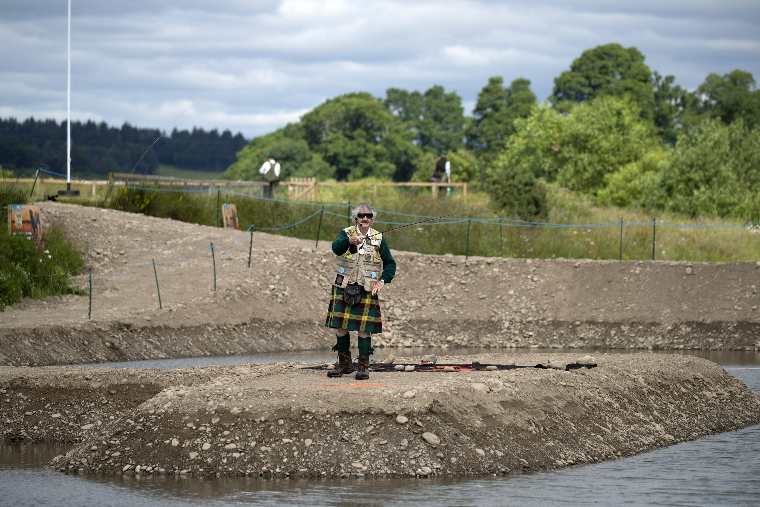 Casting demo at the Scottish game fair at Scone Palace