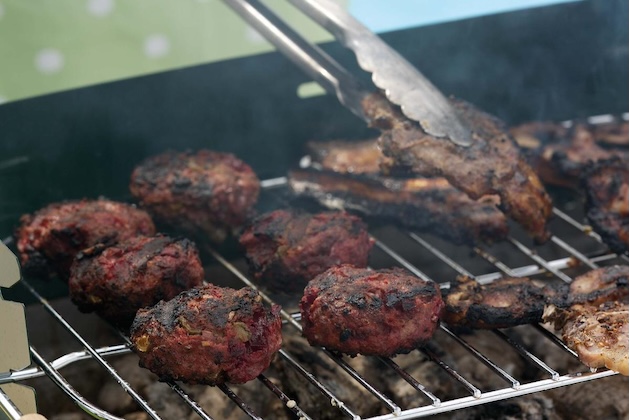 barbecuing burgers