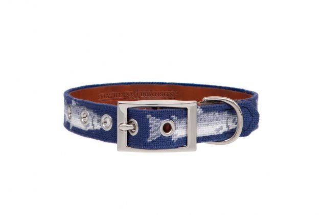 A blue dog collar decorated with salmon