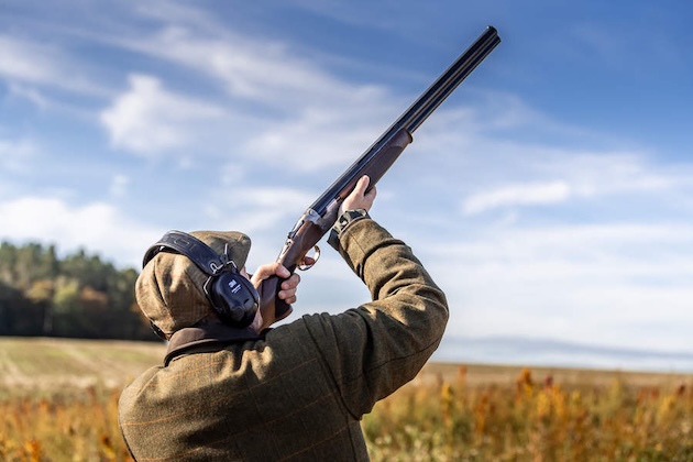 man wearing ear defenders 