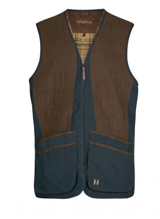 A blue shooting waistcoat by Harkila - some of the essential, must-buy sporting kit available at the Game Fair