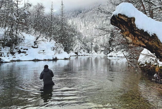 Casting for huchen in thesnow in Slovenia