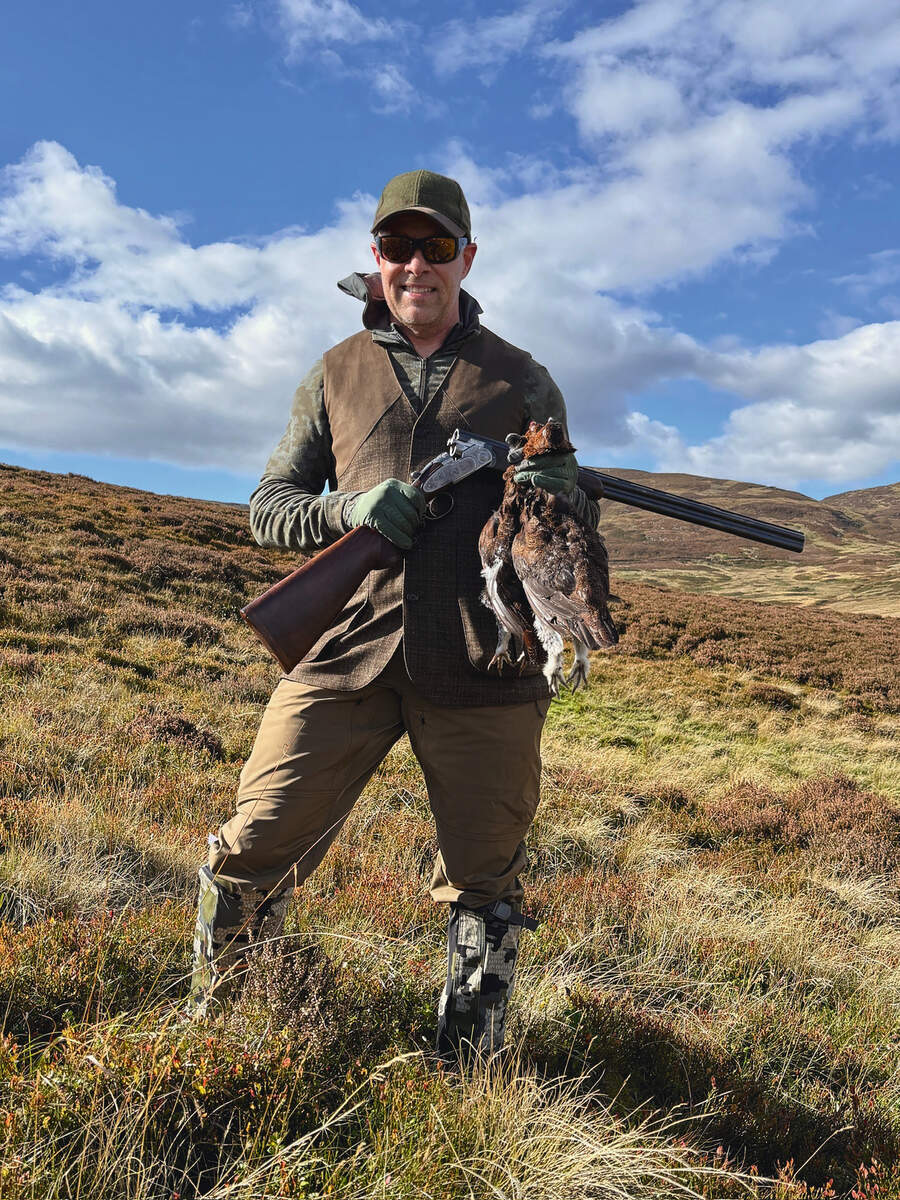 man with grouse