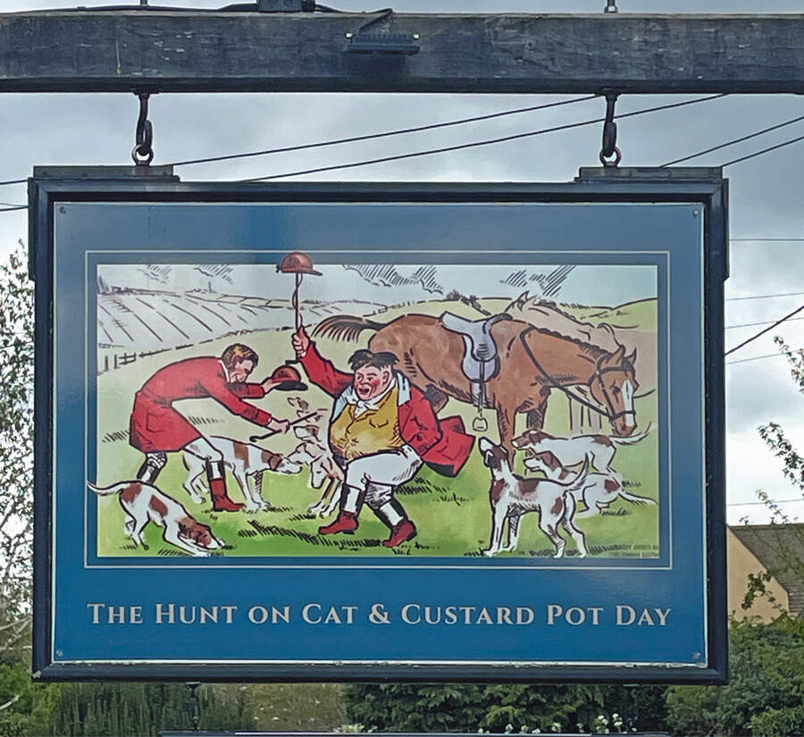 Cat & Custard Pot signpost