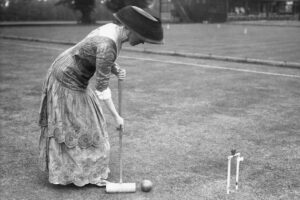 Edwardian lady playing croquet