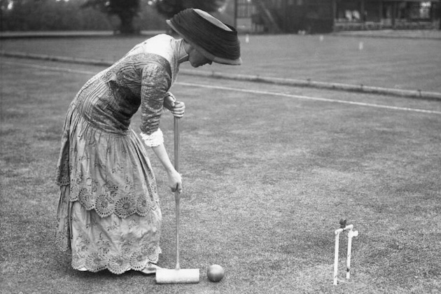 Edwardian lady playing croquet