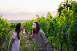 Bordeaux vineyard with two women