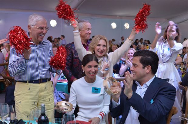 Bidders enjoying the Naples Winter Wine Auction 2018.
