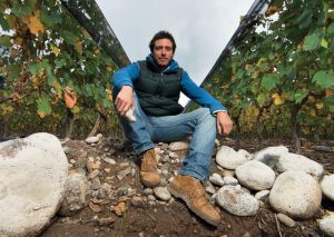 Sebastián Zuccardi sitting in one of the family’s Malbec vineyards in the Uco Valley, Argentina