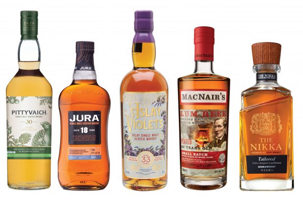 Five bottles of different whiskies