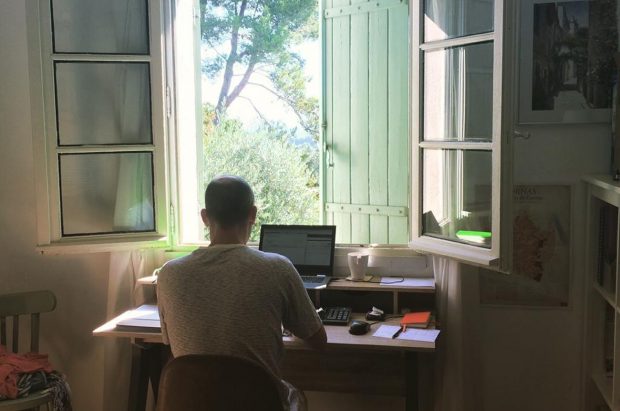 Matt Walls writing Wines of the Rhône at his desk