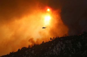 A helicopter tackling the Bobcat Fire near Los Angeles in 2020