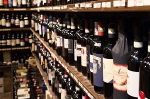 Bottles of wine on shop shelves