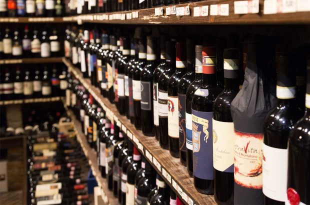Bottles of wine on shop shelves