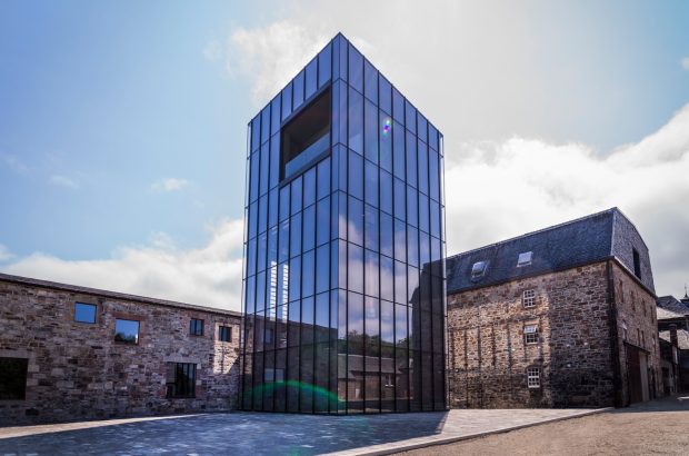 Exterior of the Glenmorangie whisky distillery building with new experimental distillery, the Lighthouse