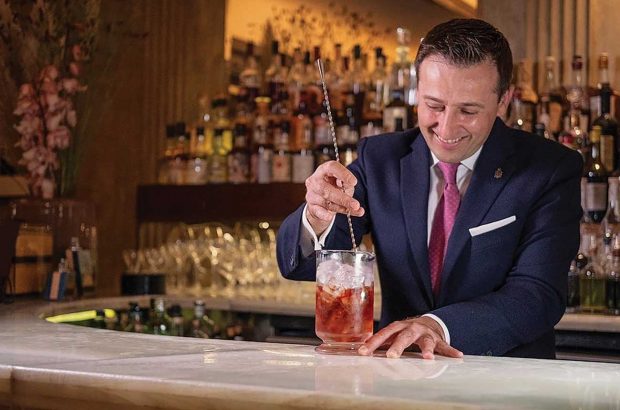 Denis Broci mixing a cocktail at Claridge's