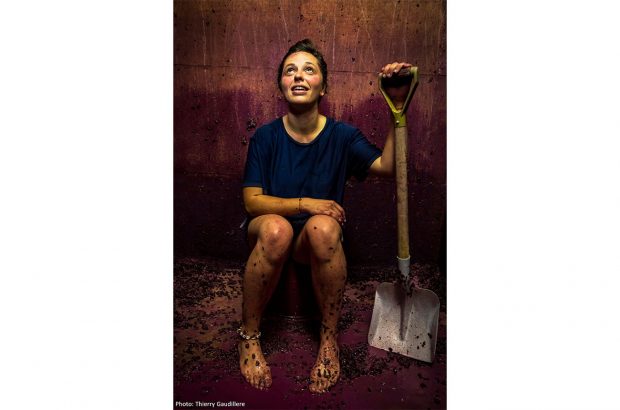 Photo by Thierry Gaudillère: Girl After Emptying a Tank at the End of the Fermentation