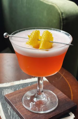 orange cocktail on a table