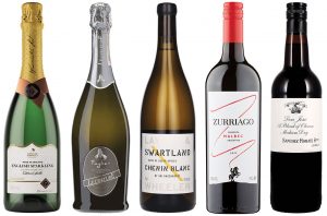 Line up of six wine bottles