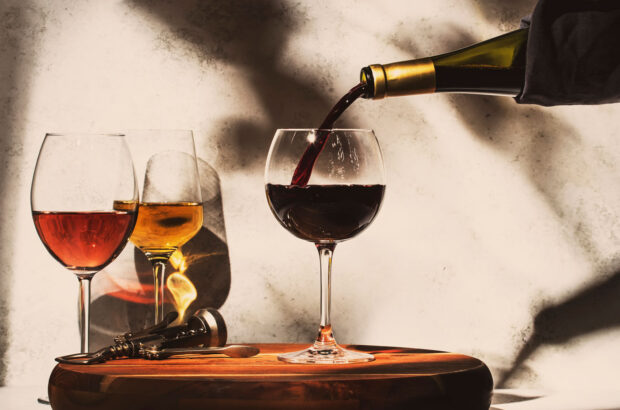 Glasses of wine on table