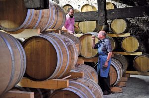 Christophe Fillioux and his father Pascal in the cellars of Cognac Jean Fillioux's La Pouyade estate near Juillac-le-Coq