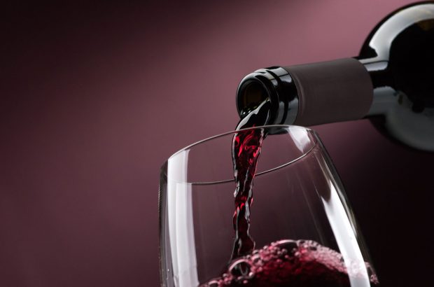 Red wine being poured into glass