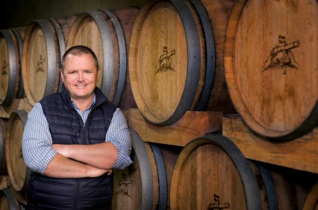 Abrie Beeslaar in a barrel cellar