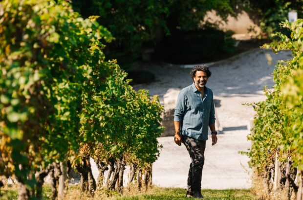 Image of Malivoire Winery general manager Shiraz Mottiar, who advocates for sustainable viticulture certification in the vineyard.