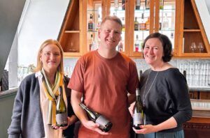 people holding wine