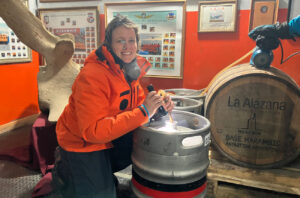 Distiller Lila Serenelli with the barrels of whisky at Base Marambio