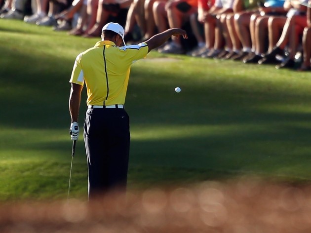 Tiger takes the infamous drop in 2013 on 15 that would ultimately lead to an 8