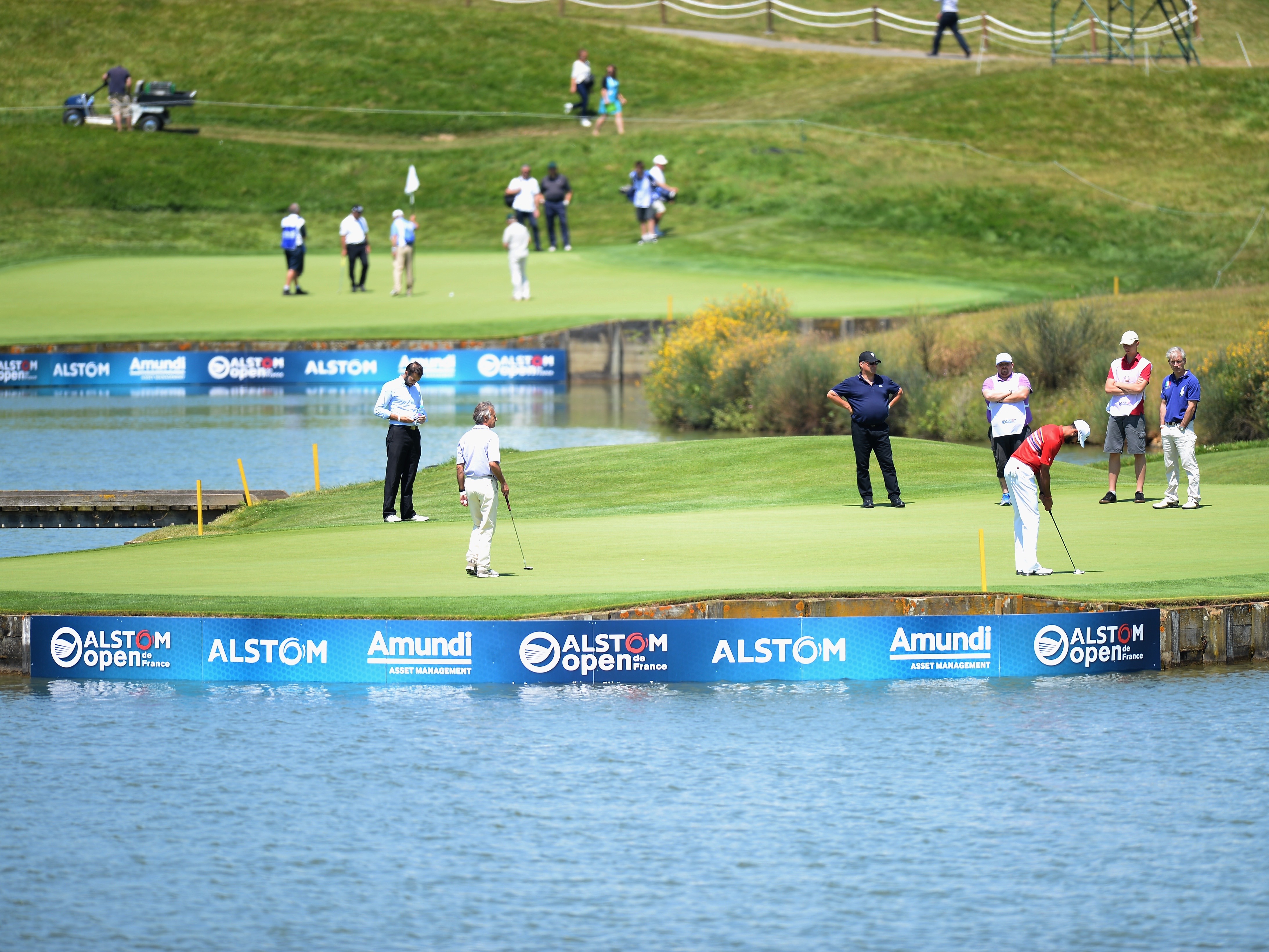 Water comes into play from tee to green on the daunting 15th hole at Le Golf National