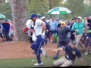 WATCH: Security Guard Takes Out Tiger Woods During Masters