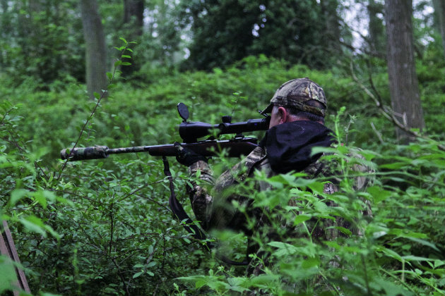 man stalking deer