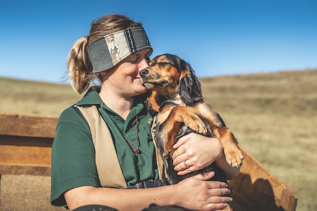 Dog with trainer