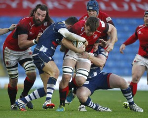 Trundling on: Ollie Stedman trucks forward for Welsh