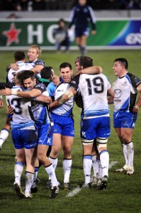 Hugs all round: Connacht's players celebrate their landmark win at Toulouse