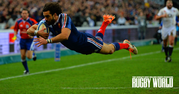 Profiteer: Yoann Huget scored two opportunistic tries at the Stade de France, as Les Bleus stormed to a big lead