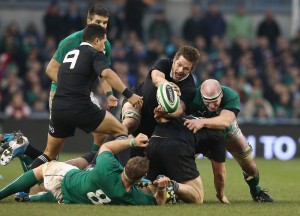 Getting stuck in: Richie McCaw in the thick of the action