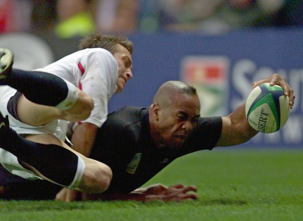 The master at work: Jonah Lomu scoring at his happy hunting ground of Twickenham