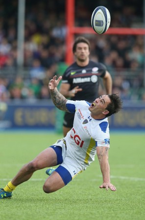 Costly slip: Zac Guildford fails to gather Hodgson's kick and so concedes a try