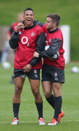 Beaming: Watson shares a joke with George Ford