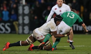 Rising star: Maro Itoje chops down Keith Earls at the Irish Independent Stadium