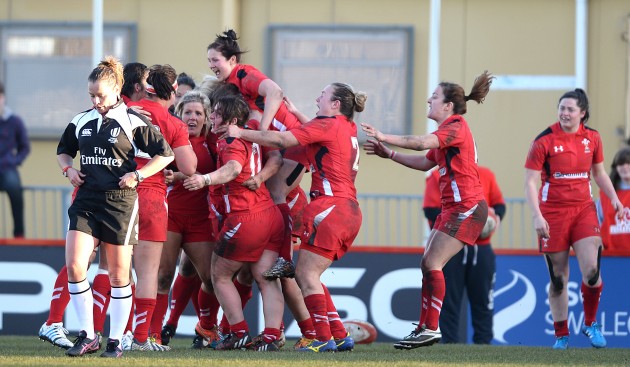 Jumping for joy: Wales Women celebrate their 13-0 win over England in Swansea. Photo Huw Evans Agency