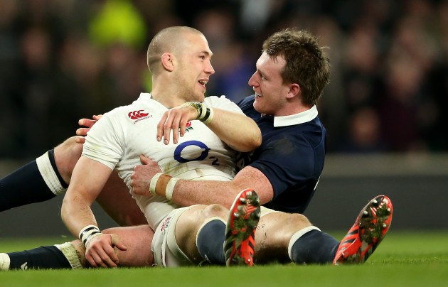 Hug from Hogg: Stuart Hogg even found time to comfort Mike Brown after his try was disallowed. (Photo: Inpho)