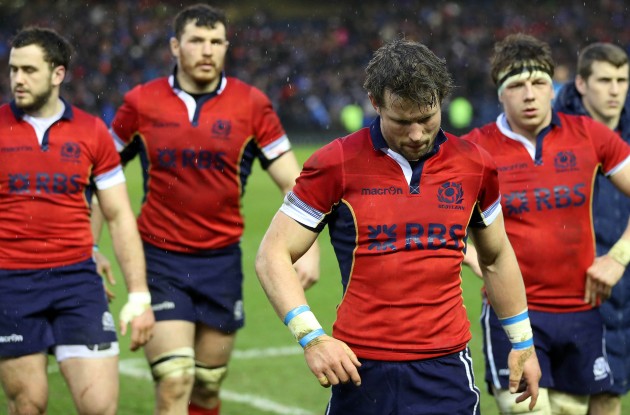 Gutted: Peter Horne (front) and his team-mates look dejected as they troop off. (Photo: Inpho)