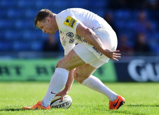 Easy does it: Chris Ashton dabs down one of his four tries. (Photo: Action Images)